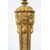 Coppia di candelieri antichi in bronzo dorato. Francia XIX secolo.