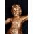 Coppia di putti antichi a tronco unico in legno dorato. Firenze fine XVII secolo.