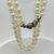 Collana di perle giapponesi con chiusura in oro bianco e diamanti