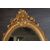 Specchiera ovale orizzontale francese del 1800 stile Luigi XV dorata foglia oro