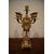 Tris composto da orologio e 2 candelabri a 5 fiamme in bronzo dorato francese del 1800