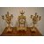 Tris composto da orologio e 2 candelabri a 5 fiamme in bronzo dorato francese del 1800
