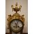 Tris composto da orologio e 2 candelabri a 5 fiamme in bronzo dorato francese del 1800