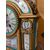 Orologio in bronzo dorato con ricche applicazioni in porcellana di Sevres