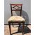 Walnut chair with rhombus motif. Directory period.     