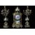 Tris composto da orologio e due candelabri francesi del 1800 meccati con quadrante in porcellana di Sevres