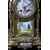 Tris composto da orologio e due candelabri francesi del 1800 meccati con quadrante in porcellana di Sevres