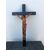 Boxwood Christ on an ebonized cross.     