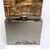 ARNALDO POMODORO, scultura "STELE", firmata in bronzo argentato, 1977