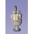 Coppia di vasi francesi del 1800 in ceramica bianca decorata blu e con putti