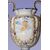Coppia di vasi francesi del 1800 in ceramica bianca decorata blu e con putti