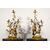  Coppia di grandi candelabri a tre luci in bronzo dorato con aironi e fiori in porcellana policroma, Francia, XIX secolo