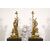  Coppia di grandi candelabri a tre luci in bronzo dorato con aironi e fiori in porcellana policroma, Francia, XIX secolo