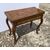 Tavolino da gioco lastronato in legno di ulivo. Toscana, XVIII secolo.