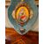 Grande acquasantiera raffigurante la Madonna della Seggiola.