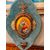 Grande acquasantiera raffigurante la Madonna della Seggiola.