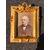 Carved wooden frame with details in pastille with floral decorations and trophies. Napoleon III period.     