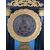 Orologio Impero in bronzo dorato e legno ebanizzato