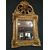 Piccola specchiera italiana del 1800 in legno dorato ed intagliato
