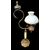 Lampada in bronzo con fusto in alabastro.Coppa paralume in vetro opaline.