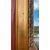 Grande specchiera in legno intagliato e dorato.