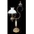 Lampada in bronzo con fusto in alabastro.Coppa paralume in vetro opaline.