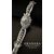 Bracciale -  orologio  a  scomparsa  in  Platino  con  Diamante  a  goccia  da  0.70  ct.