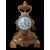 " GARNITURE " COMPOSTA DA OROLOGIO CON CANDELIERI IN BRONZO DORATO 