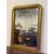 Specchiera in legno intagliato dorato con treccia sui lati XIX secolo .  118 x 87 