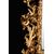 Specchiera antica a cartoccio in legno dorato e intagliato.Firenze XVIII secolo.