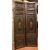 PTI754 - Porta in noce, due battenti scolpiti con mascheroni e decori fogliacei, epoca '800, misure cm L 106 x H 211