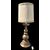 Candeliere in bronzo pesante trasformato a lampada da tavolo.Stile barocco.