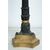 Coppia di candelabri antichi Carlo X a quattro fiamme in bronzo dorato e bronzo brunito. Francia inizio XIX secolo.