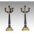 Coppia di candelabri antichi Carlo X a quattro fiamme in bronzo dorato e bronzo brunito. Francia inizio XIX secolo.