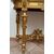 Antique Napoleon III console table in gilded and carved wood with a white marble top. France, 19th century.