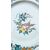 Piatto in maiolica con decoro floreale e uccello ‘dal collo ritorto’.Cerreto Sannita.