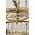 Lampadario antico Impero in bronzo dorato con pendenti in vetro sfaccettato. Francia XIX secolo.