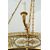 Lampadario antico Impero in bronzo dorato con pendenti in vetro sfaccettato. Francia XIX secolo.