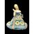 Scultura in terraglia raffigurante figura femminile con cesto di fiori. Manifattura Agostinelli e dal Pra’. Nove di Bassano.