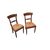 Set of 4 French Empire style chairs with richly carved backrests