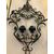 Pair of wrought iron chandeliers