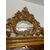 Specchiera in legno intagliato e dorato. Lombardia fine 700