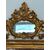 Specchiera in legno intagliato e dorato. Lombardia fine 700
