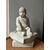 Scultura di un bambinon seduto, marmo bianco