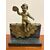 Statuina di bronzo di un putto seduto