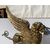 Pair of gilded bronze fire dogs. France, early 19th century.