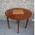 Inlaid 20th-century console/game table