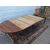 ROUND EXTENDABLE TABLE IN WALNUT, 19th CENTURY. L129xW131xH74 cm. Total extension 370 cm
