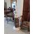 Gray marble column with white marble cherub statue