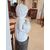 Gray marble column with white marble cherub statue